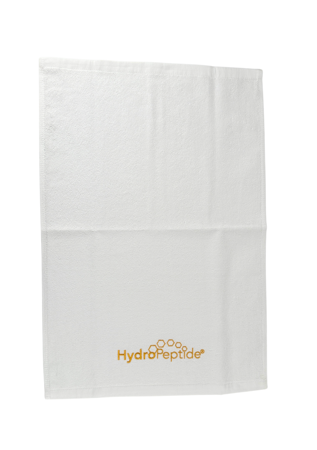 TOWEL HYDROPEPTIDE SMALL, WHITE WITH GOLDEN LOGO 
40x60 cm HydroPeptide logóval ellátott kis pamut törölköző, fehér arany hímzéssel